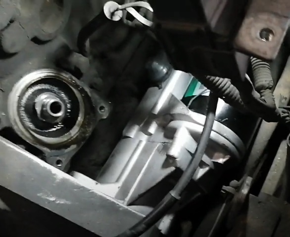 Upper view of a Toyota forklift starter attach on the engine